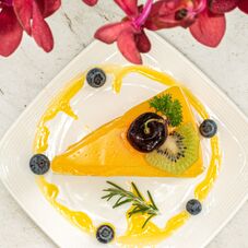 top view of a creamy lemon cake slice with a cherr 2025 02 02 20 26 37 utc 1