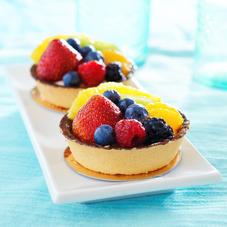two tarte aux fruits desserts on a plate 2025 04 01 01 31 16 utc 1